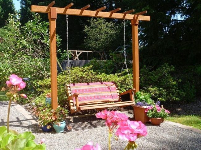 Wooden Pergola With Hanging Swing