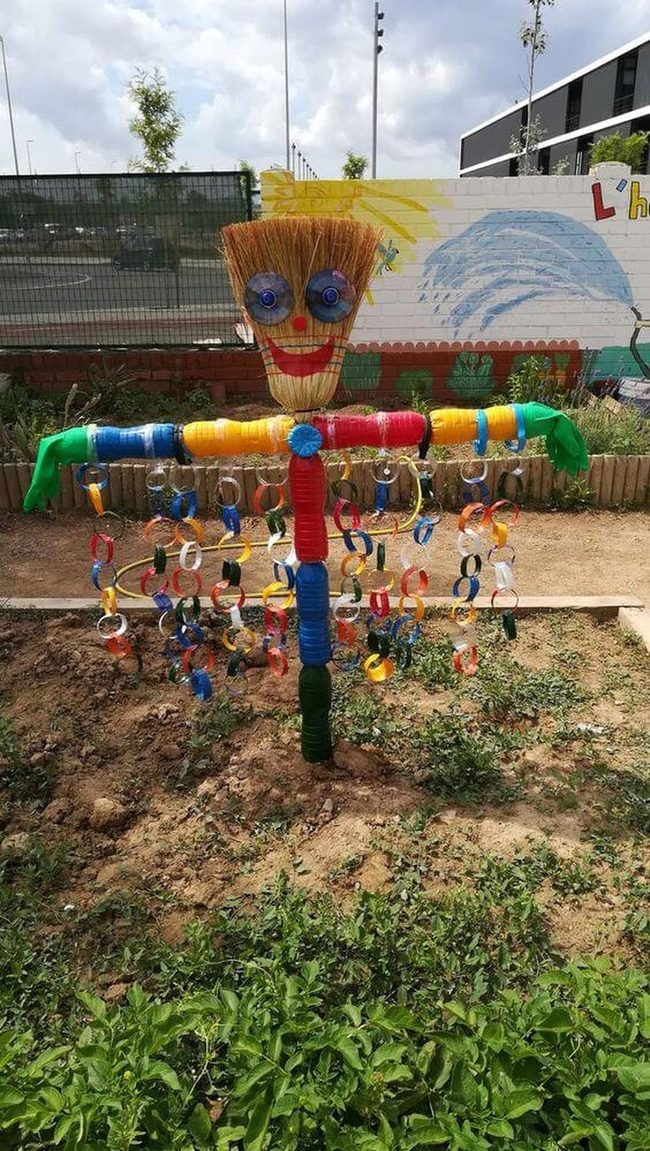 Colorful Garden Figure With Recycled Materials