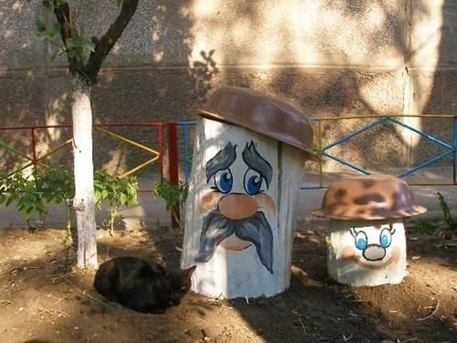 Whimsical Tree Stump Characters Garden