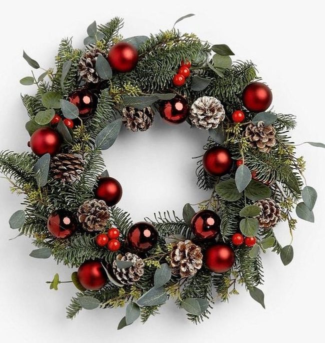 Red Ornaments On Frosted Pine
