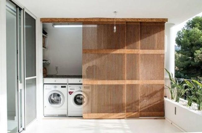 White Laundry With Wooden Slat Doors