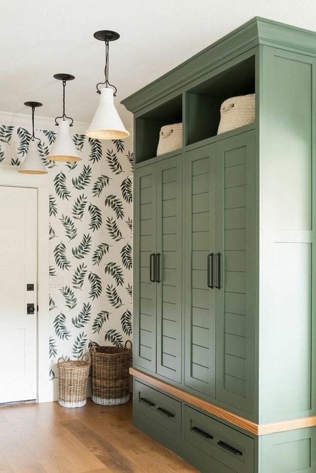 Deep Green Cabinets With Leafy Walls