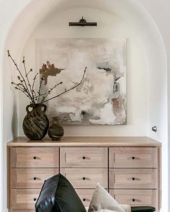 Black Vessels Against White Walls