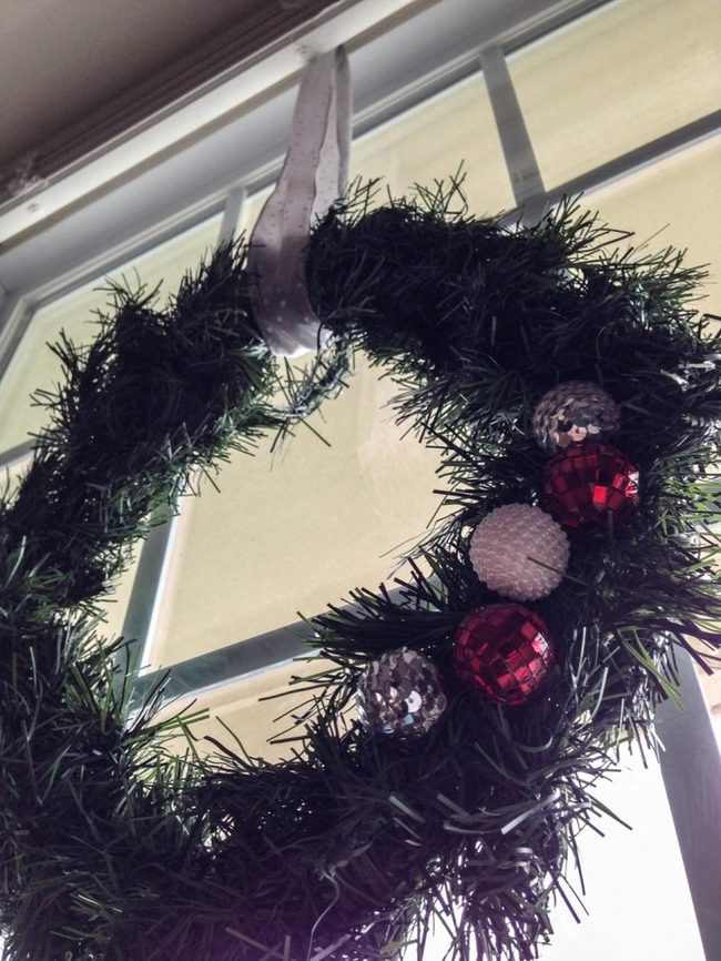 Glass Ornaments Meet Evergreen Branches