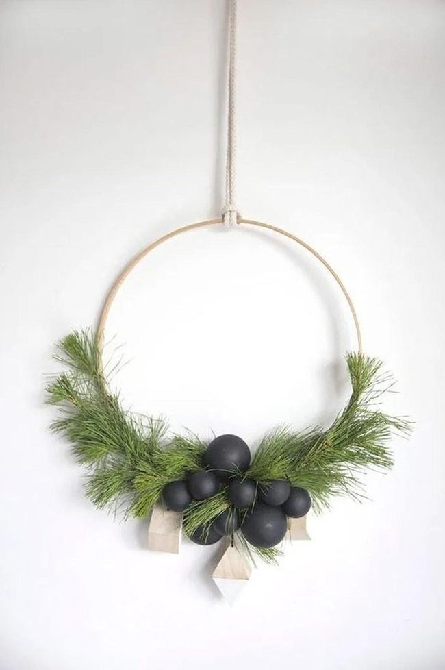 Black Ornaments On Green Pine