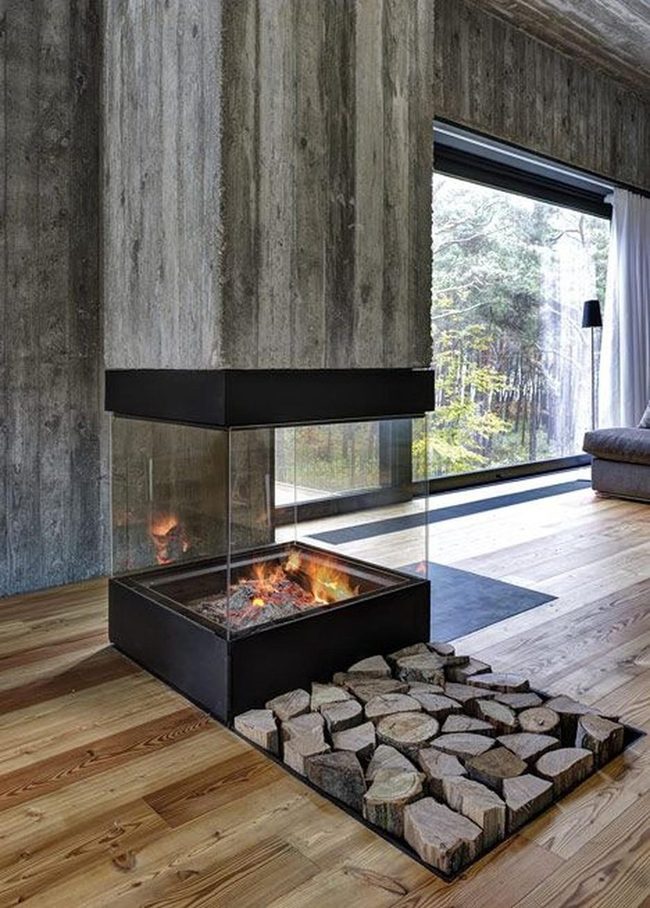 Glass Fireplace With Stacked Firewood