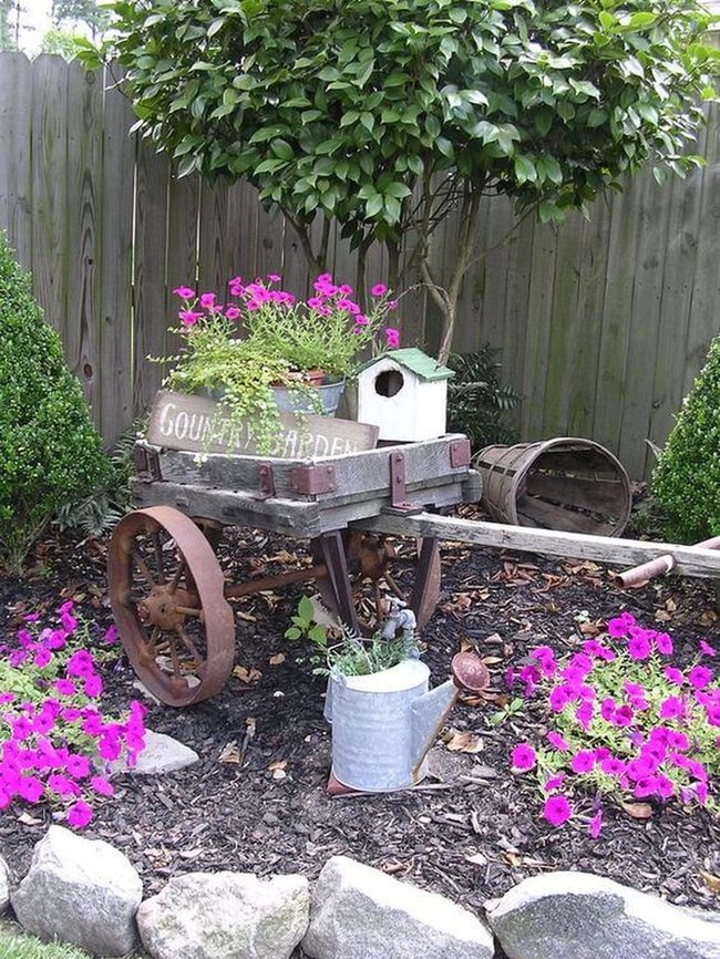 Wheelbarrows Overflowing With Cascading Blooms