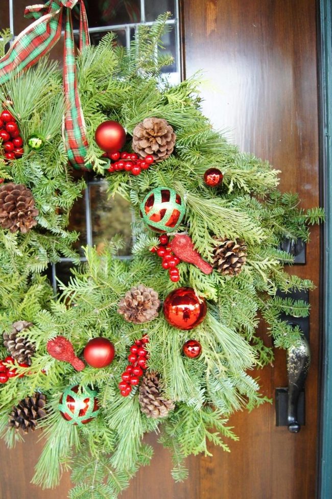 Shimmering Red Ornaments On Pine
