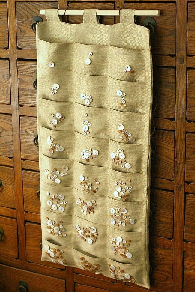 Cream Buttons Behind Tan Pockets