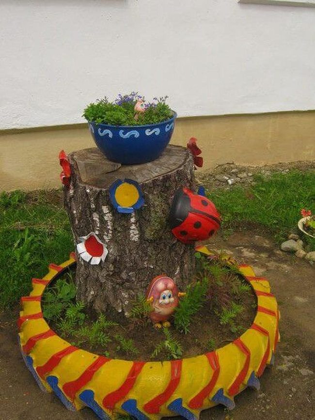 Painted Tire Garden With Stump