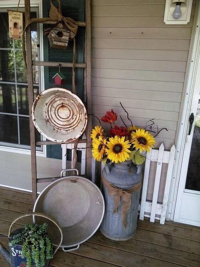 Autumn Flowers In Metal Jugs