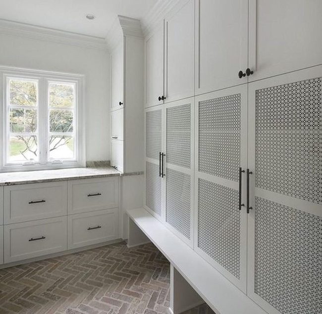 White Cabinetry Meets Patterned Brick