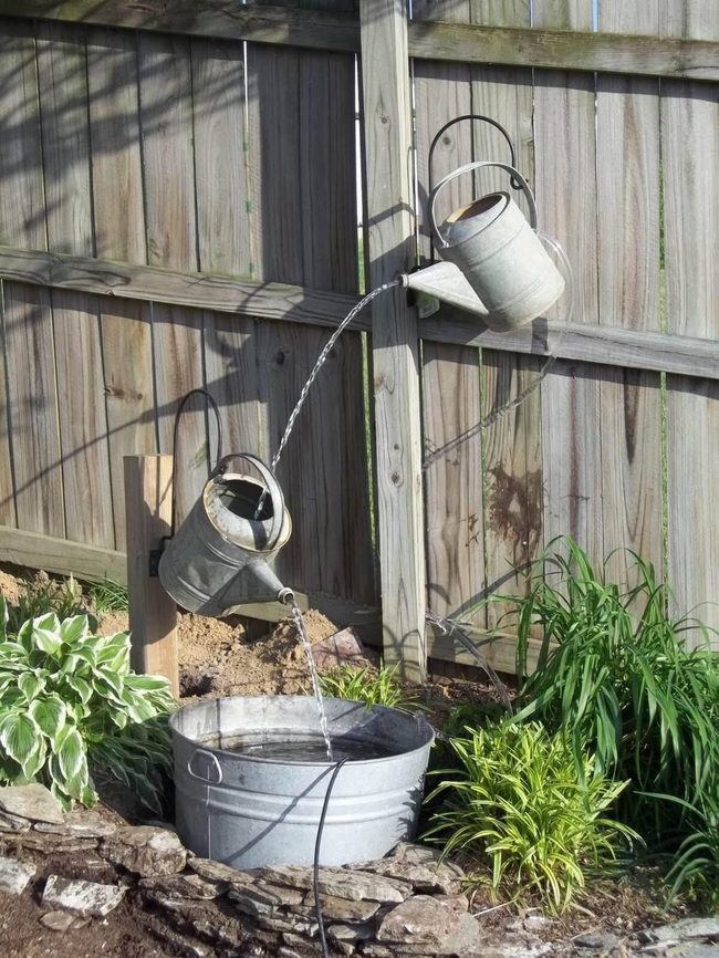 Floating Watering Cans Water Feature