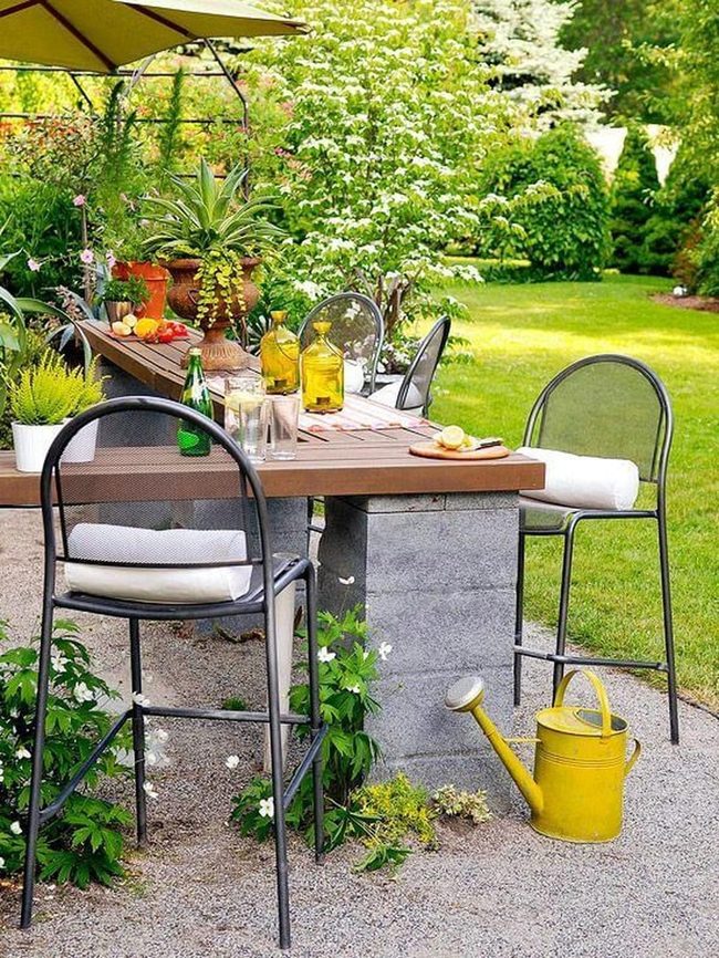 Outdoor Table With Green Privacy Screens