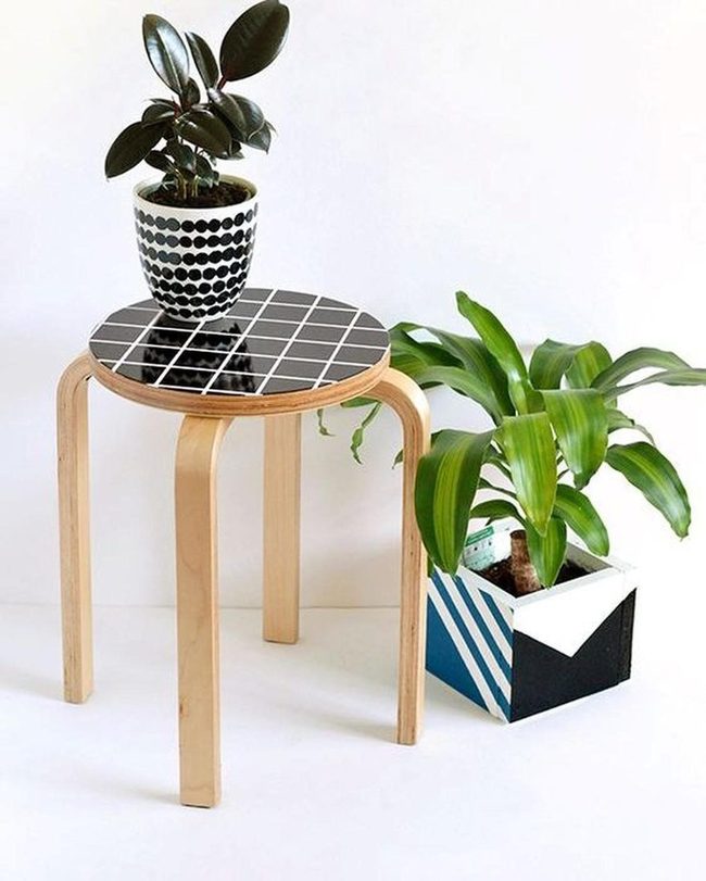 Wooden Table With Black And White Tiles