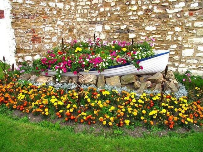 Golden Petunias Cascade Stone Walls