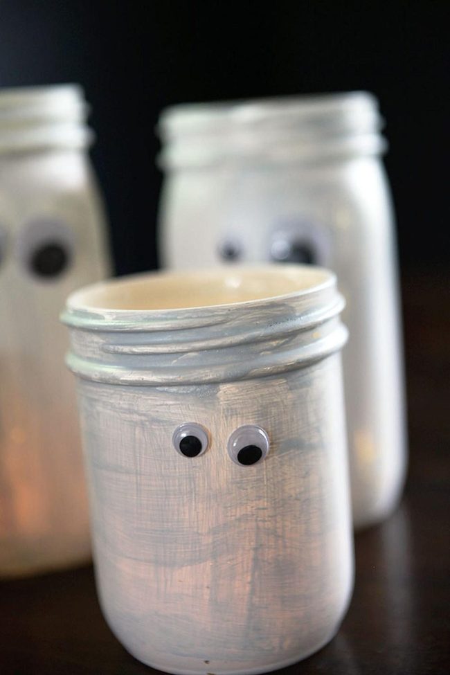 White Jars With Googly Eyes