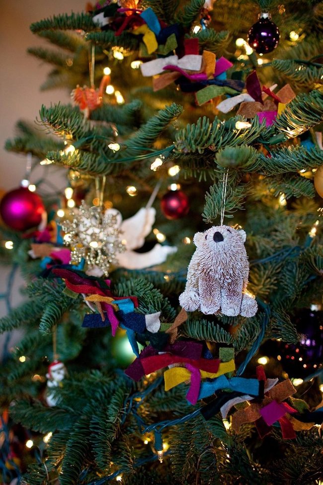 Sparkling Ornaments On Green Branches
