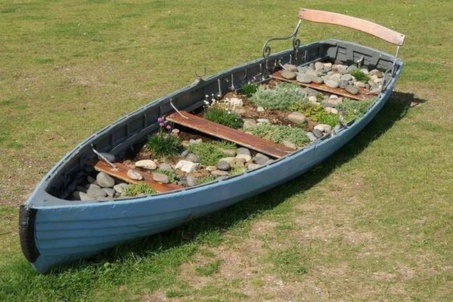 Weathered Blue Boat Garden Beds