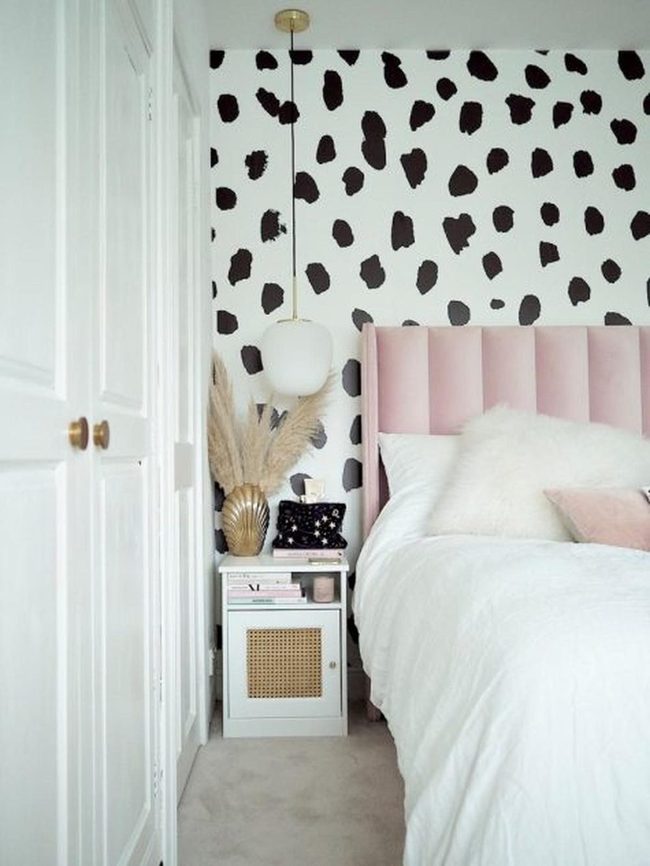 Black Spotted Walls Pink Headboard