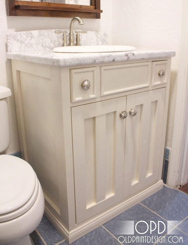 Cream Cabinets Meet Blue Tiles