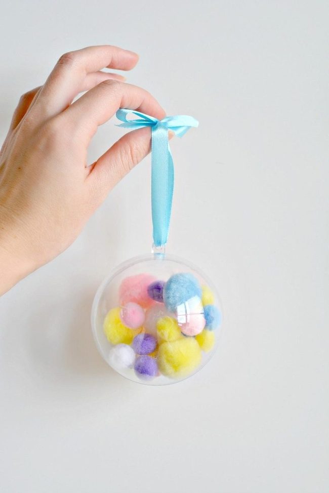 Colorful Pom-Poms Inside Crystal Globe