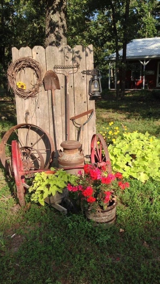 Aged Metal Garden With Living Blooms