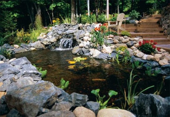 Stone-Edged Pond With Cascading Water