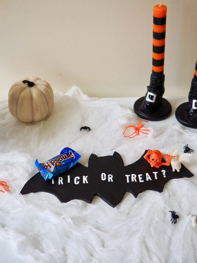 Black Bat Sign White Pumpkins