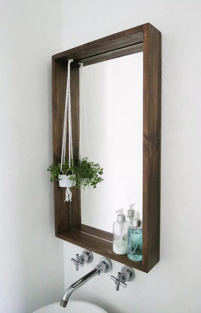 Wood Mirror With Cascading Greenery