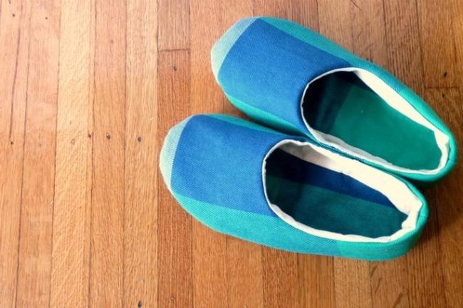 Blue Teal Slippers On Warm Wood