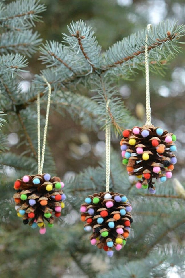 Colorful Pompoms On Pinecones