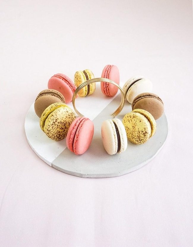Pastel Macarons On Gray Plate