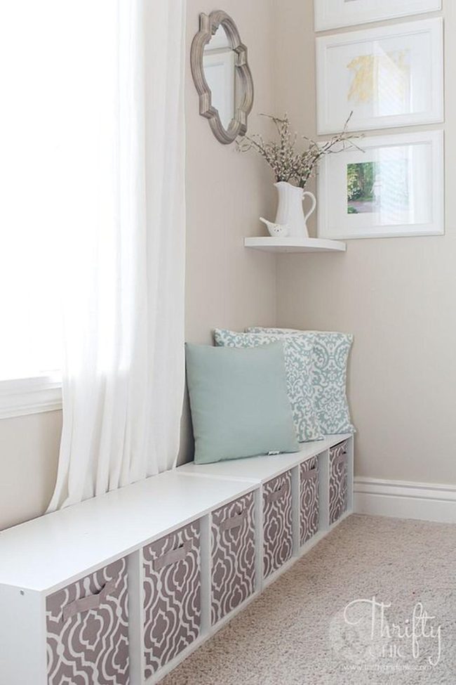 White Corner Nook With Blue Pillows