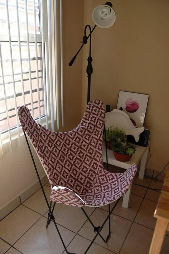 Red Diamond Chair Anchors Contemporary Space