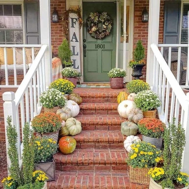 Autumn Mums and Pumpkins on Brick
