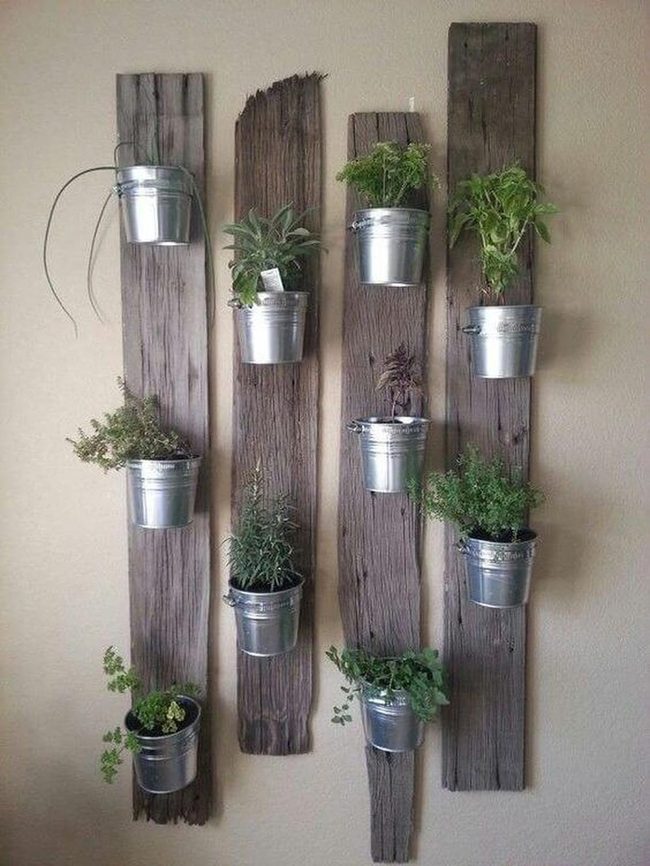 Metal Buckets On Wood Wall Garden