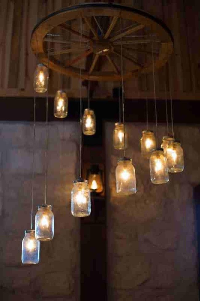 Suspended Glass Jars Illuminate Garden