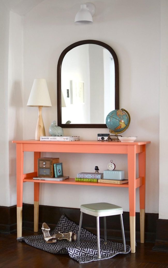 Dark Wood Floors Meet Coral Accents