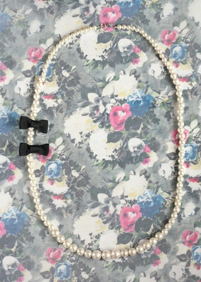 Pearl Strands On Floral Gray