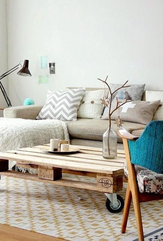 Beige Couches With Wooden Rolling Tables