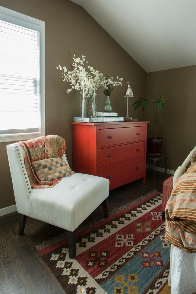 Red Dresser In Warm Brown Bedroom