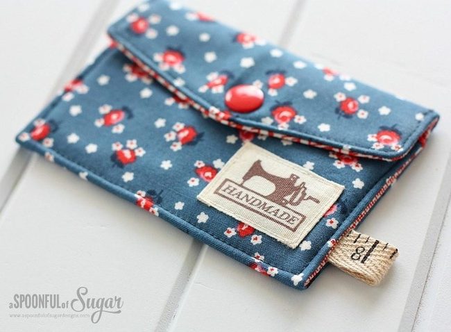 Blue Fabric Pouches With Red Wildflowers