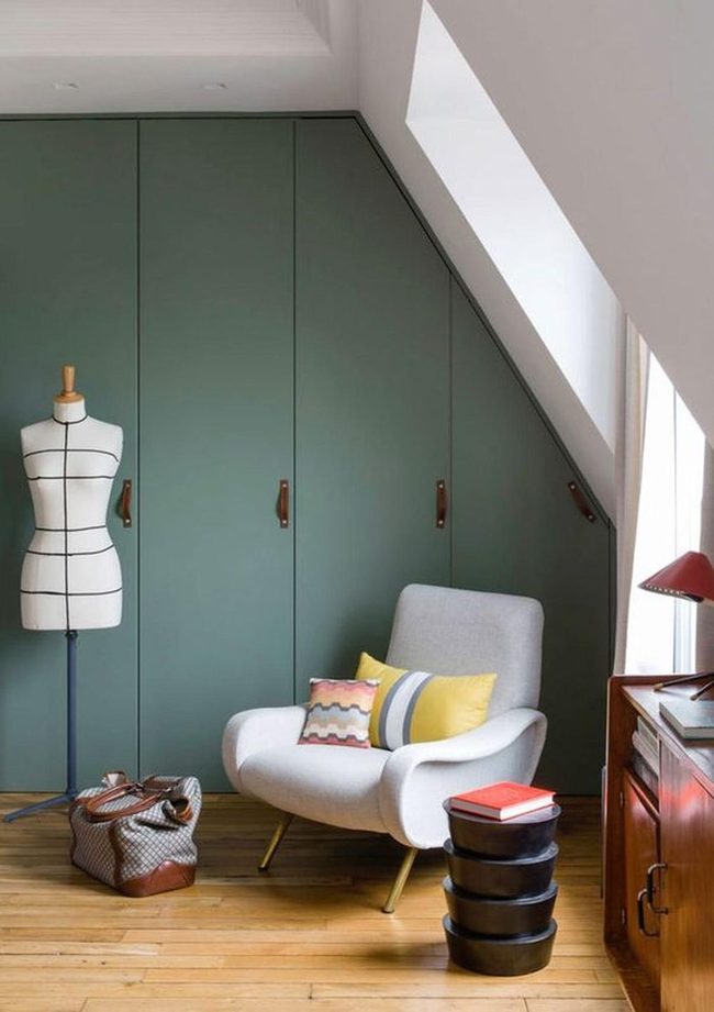 Green Sloped Closets With Red Accents