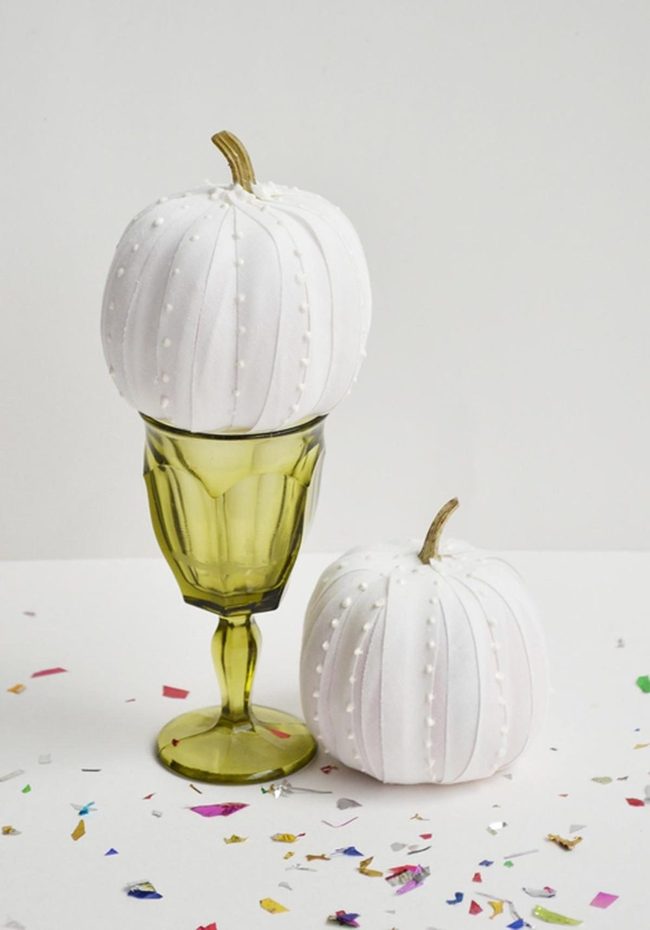 White Pumpkins In Green Glass
