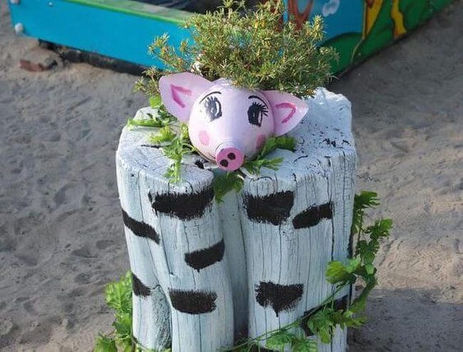 Painted Stump Planter With Spilling Greenery