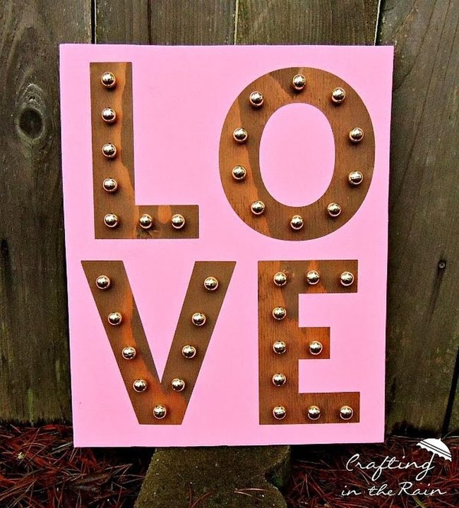 Pink Wood Letters With Glowing Bulbs