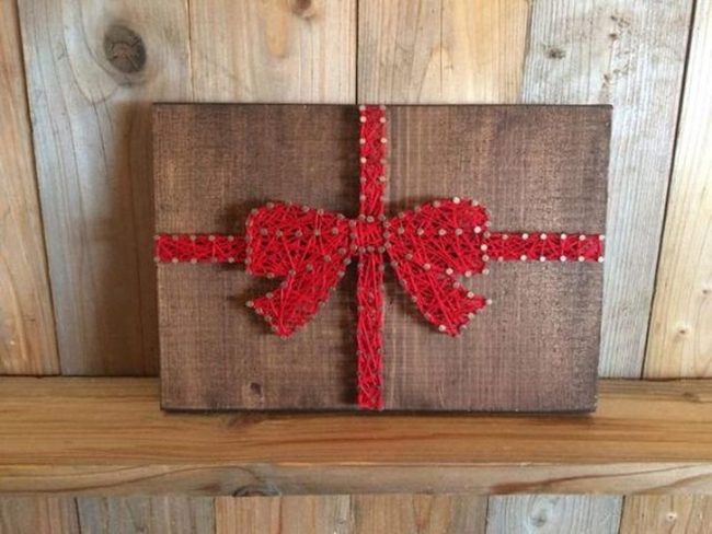 Red Thread Bows On Wood