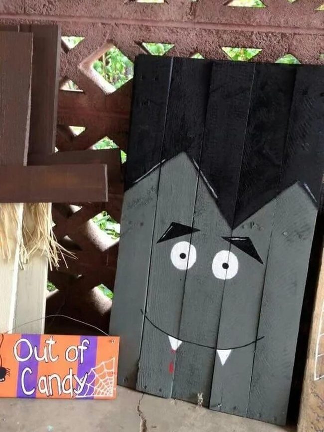 Grinning Fangs On Weathered Wood