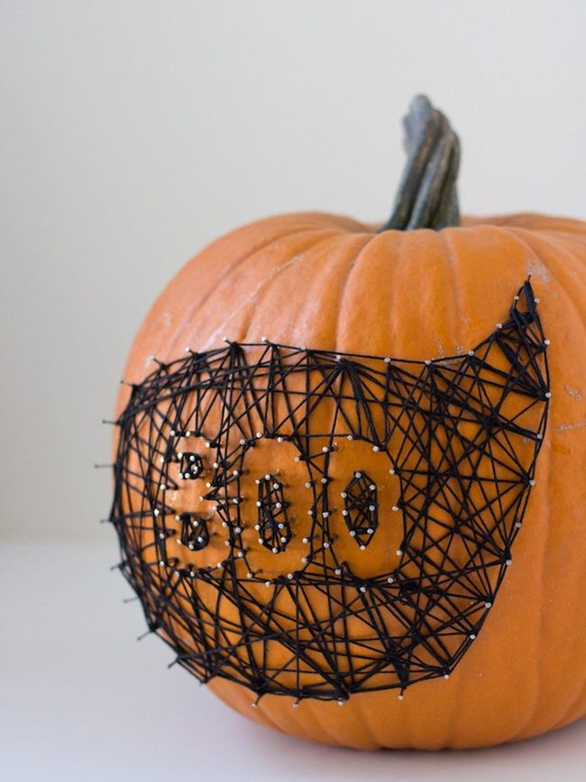 Carved Pumpkins With String Details